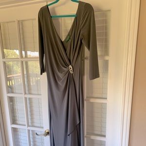 Beautiful Gown with cascade, rhinestone clasp and faux wrap style.